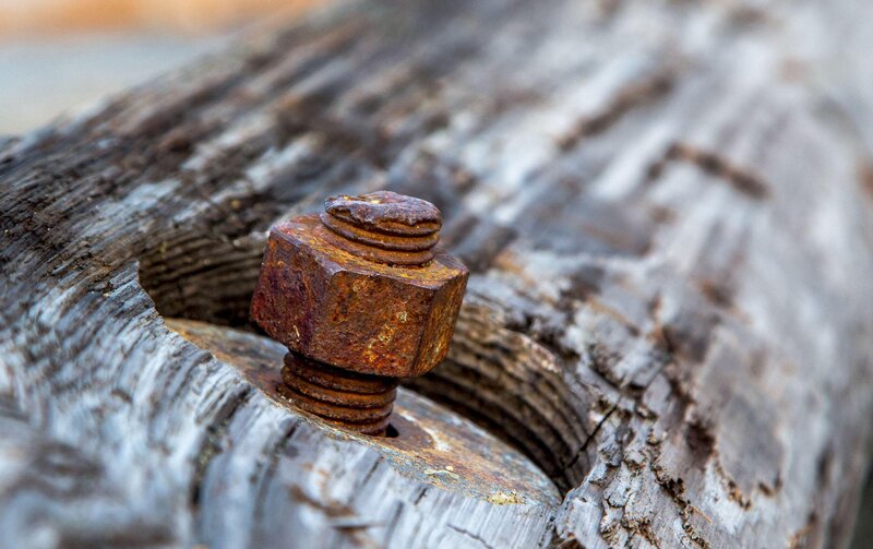 Rusty Bolt in Wood