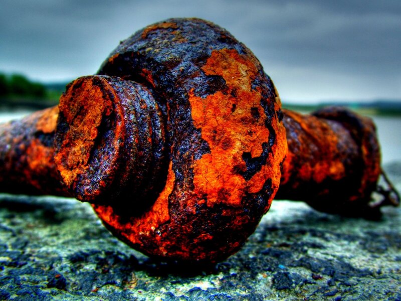 Rusty bolt on concrete