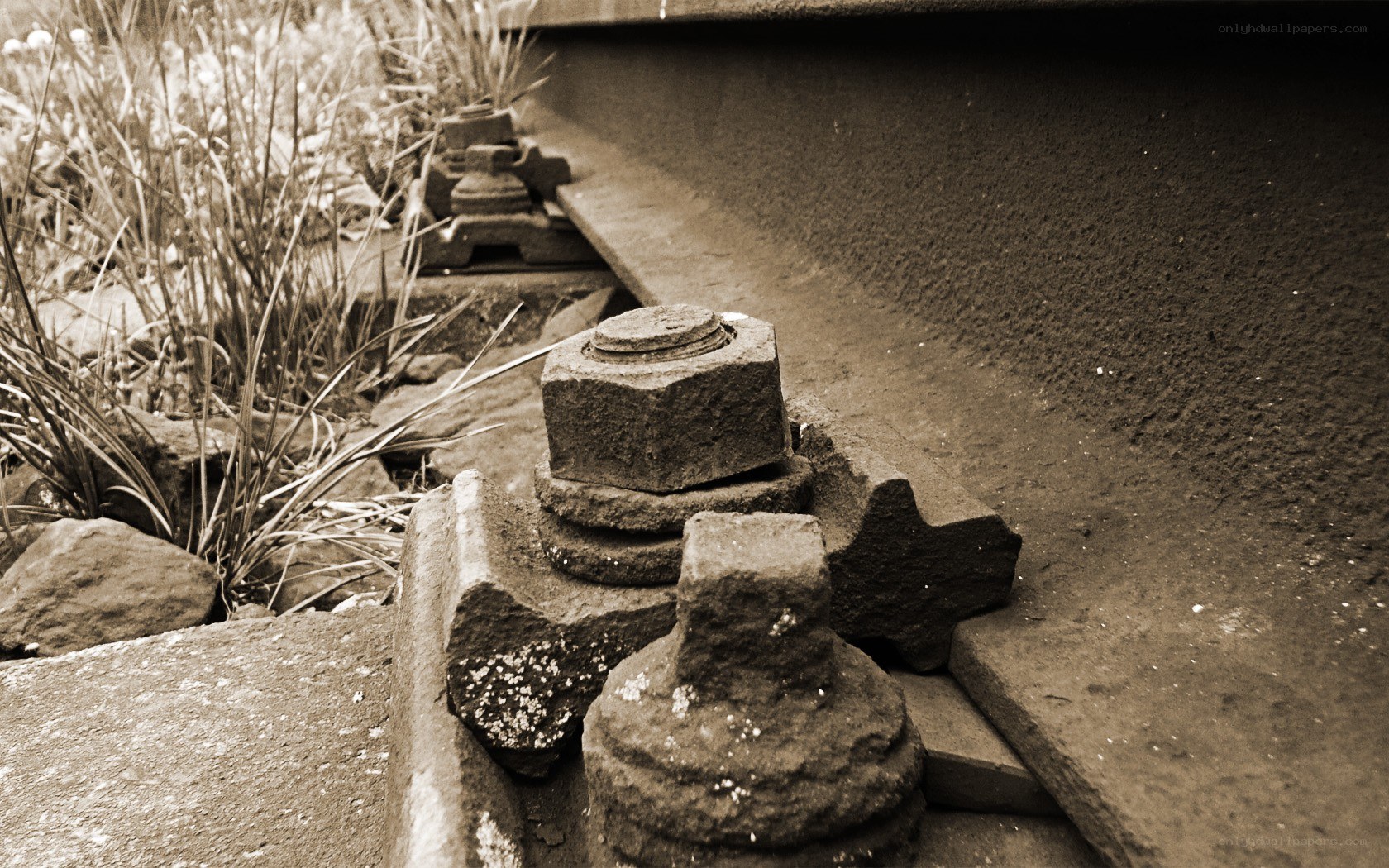 rusty bolts on a railway track