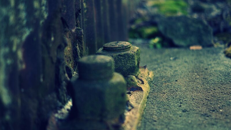 Rusty Bolts on Pavement