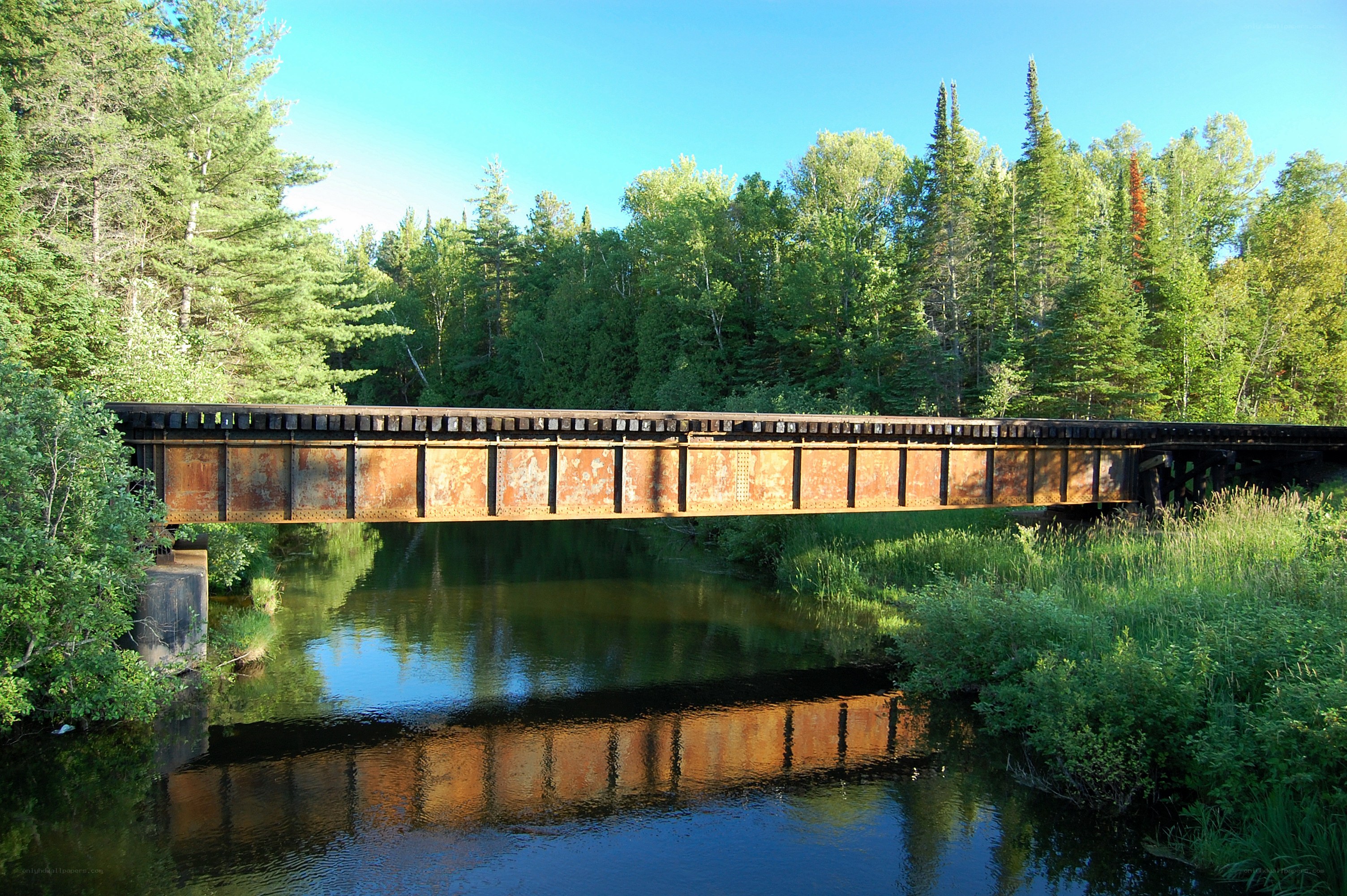 Rusty bridge over a river