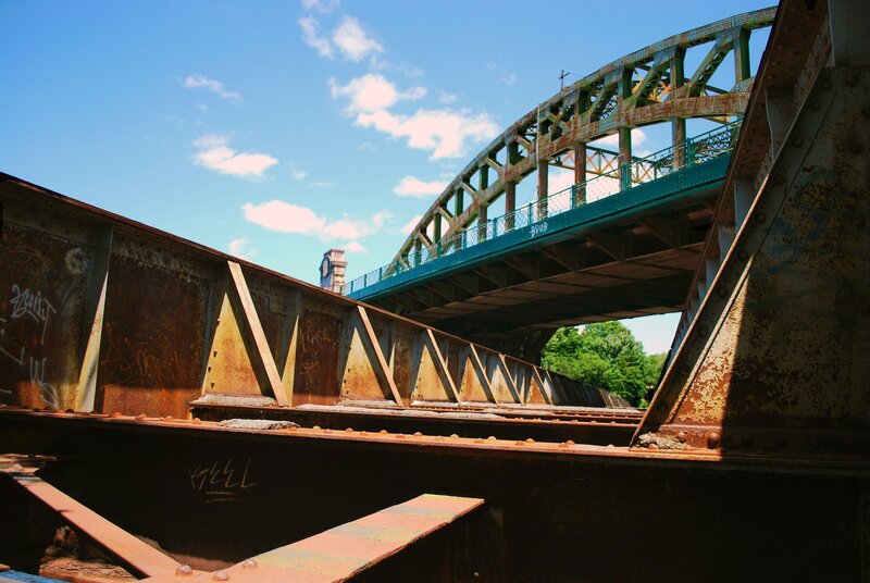 Rusty bridge under blue sky