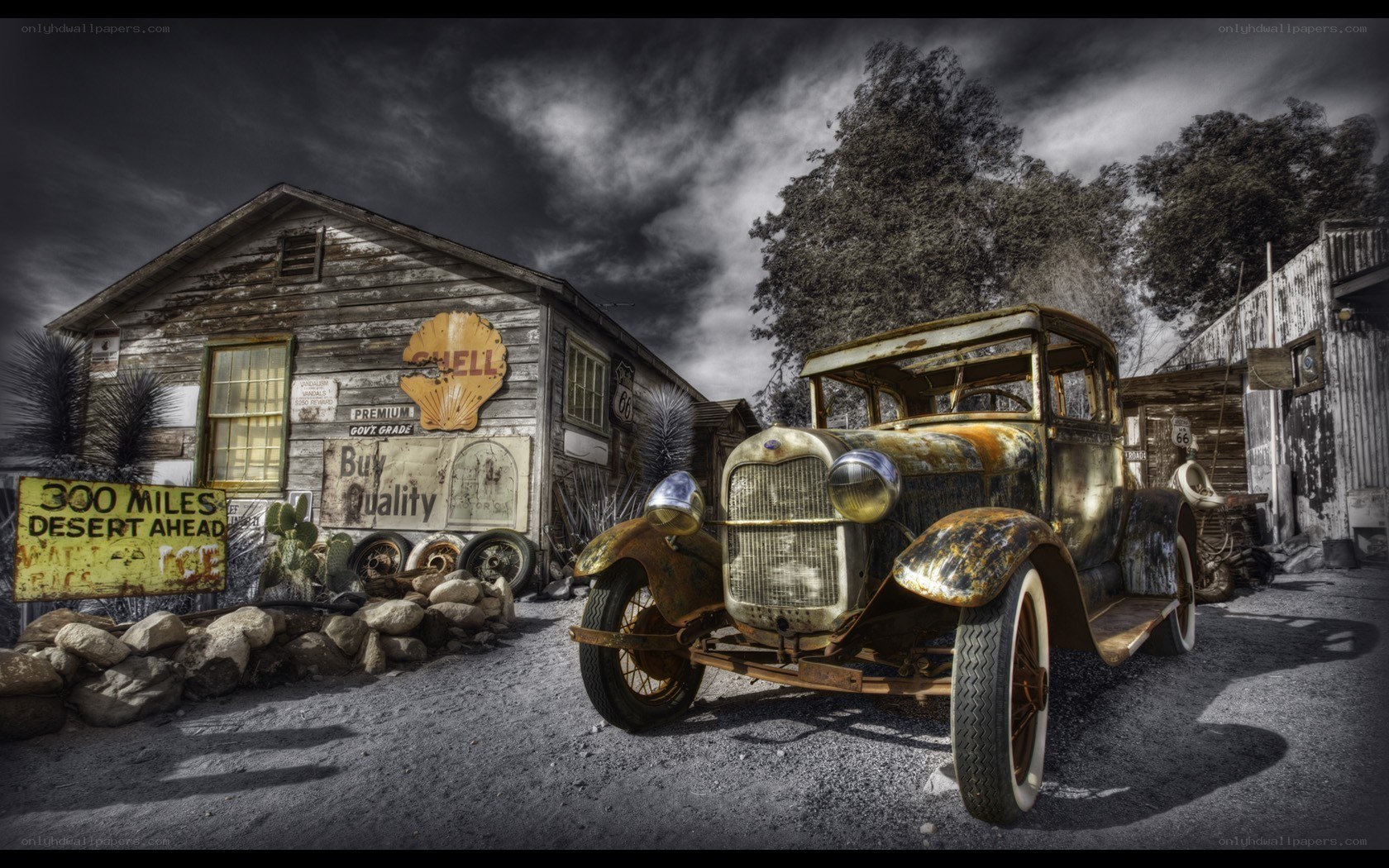 Rusty car at old gas station