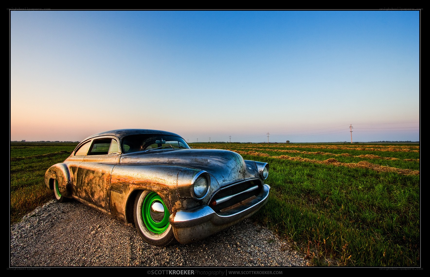 Rusty car in a field