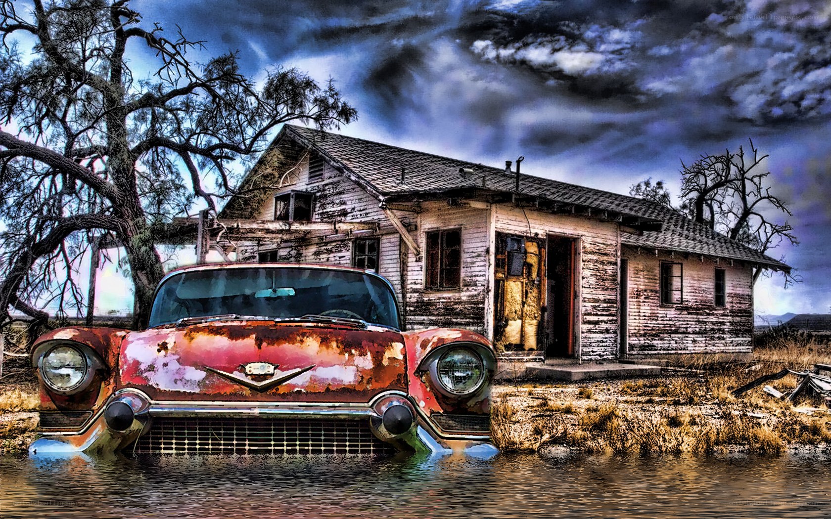 Rusty car in flooded ruins