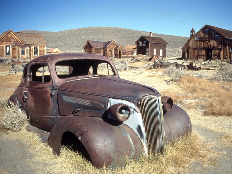 Rusty car in ghost town