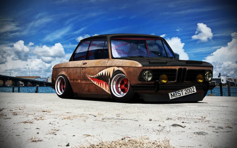 Rusty car with shark design