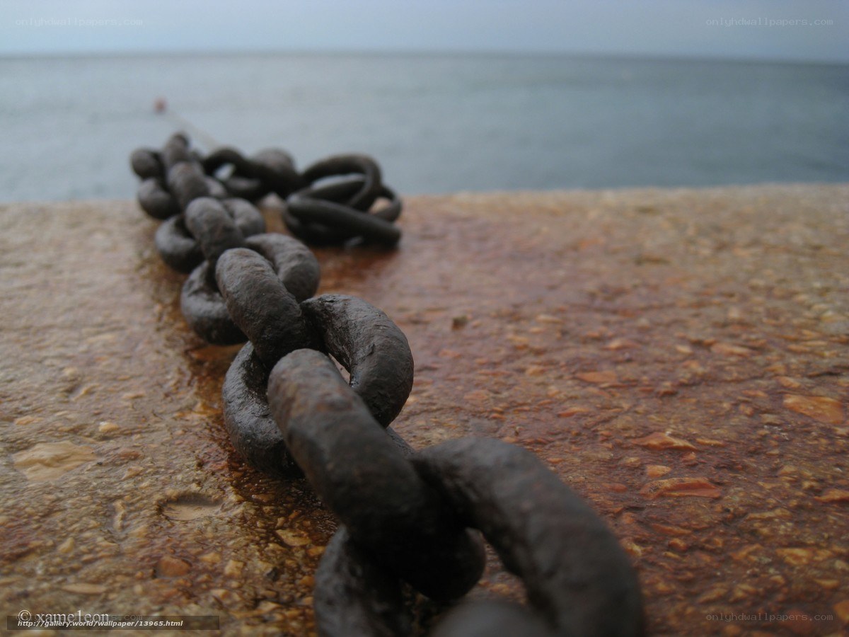 Rusty chain on a pier