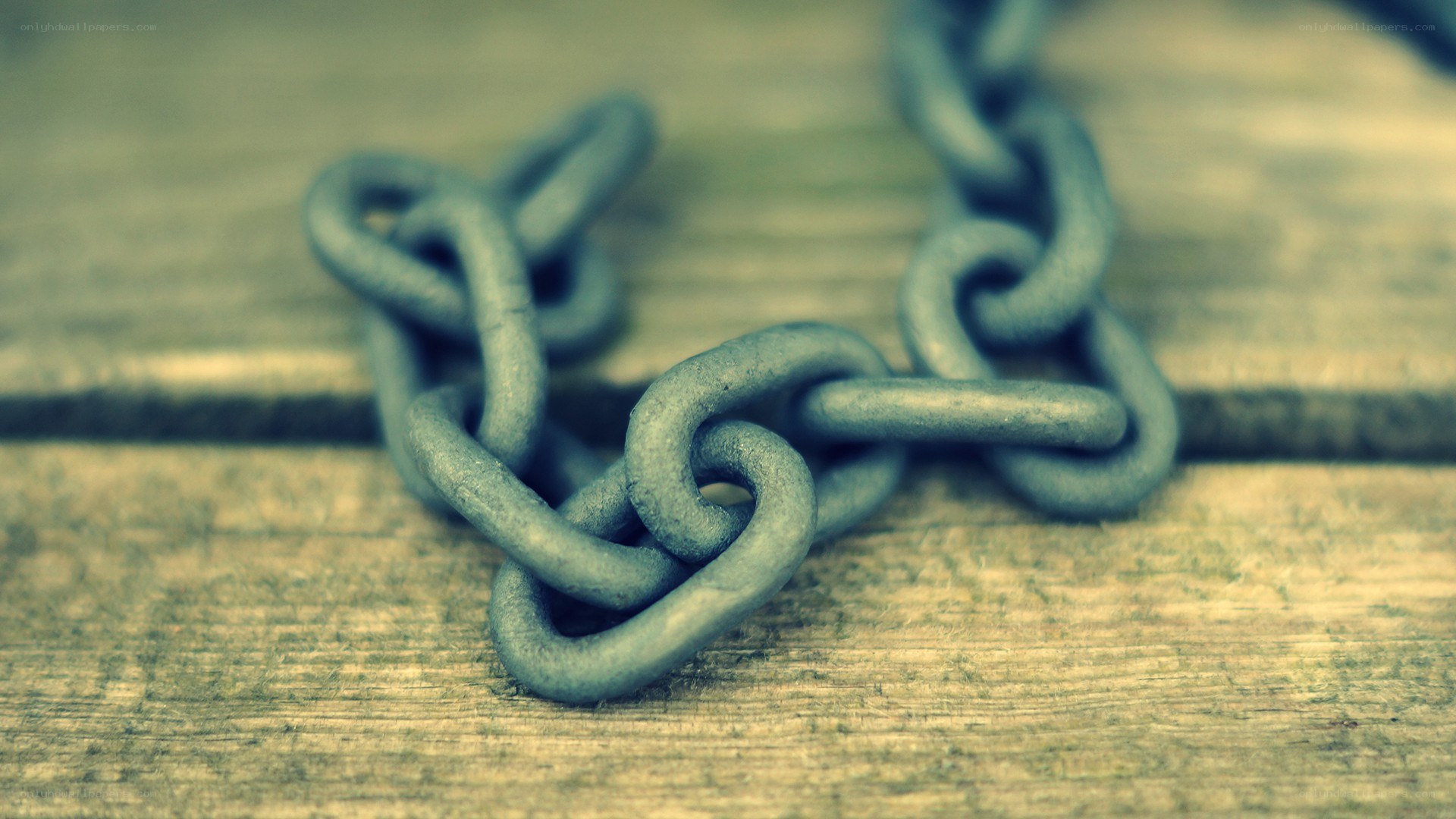 rusty chain on wood