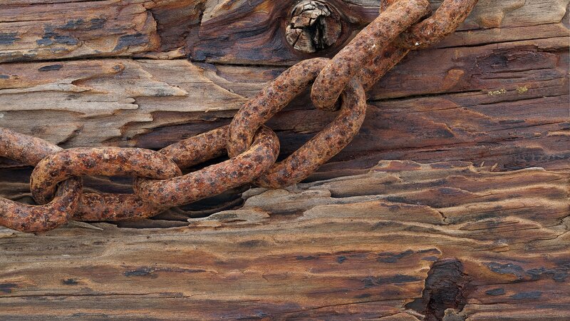 Rusty Chain on Wood — Brown, Dramatic, Photograph