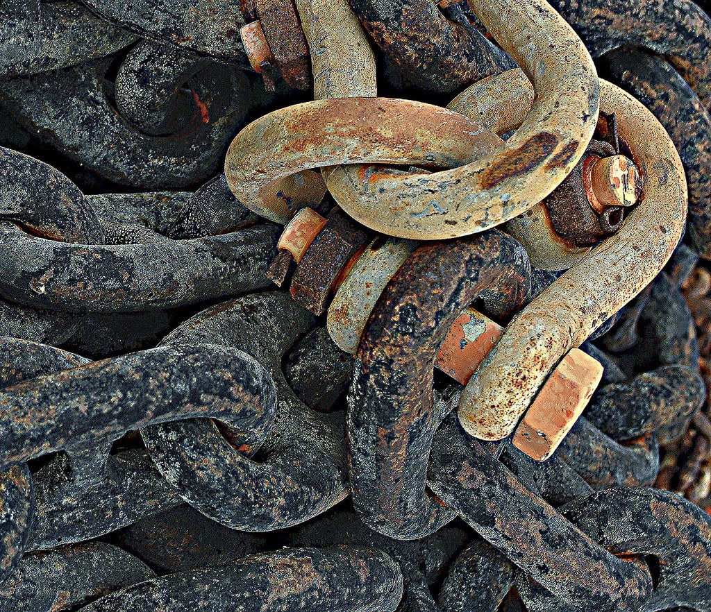 rusty chains in a pile