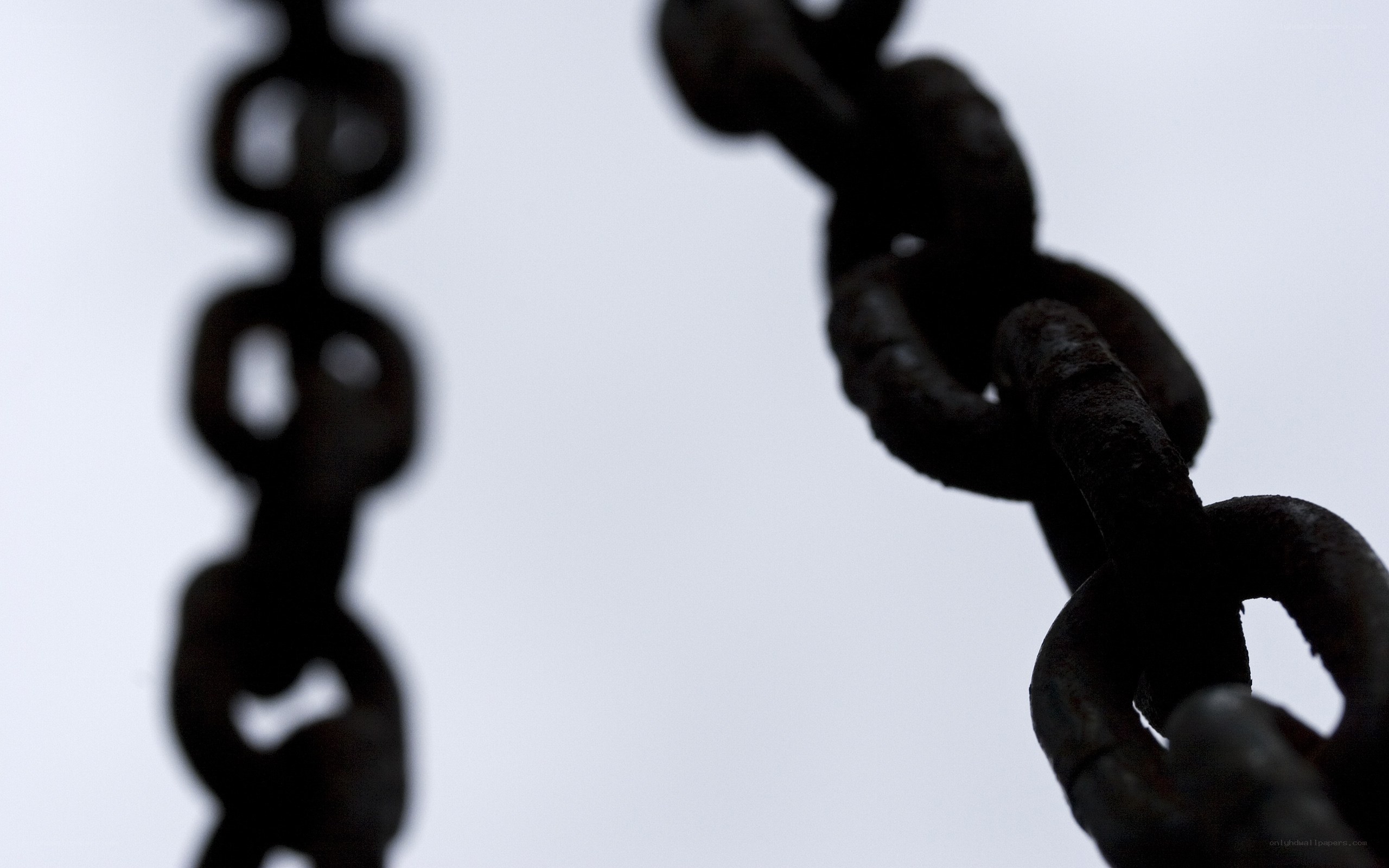 Rusty chains in silhouette