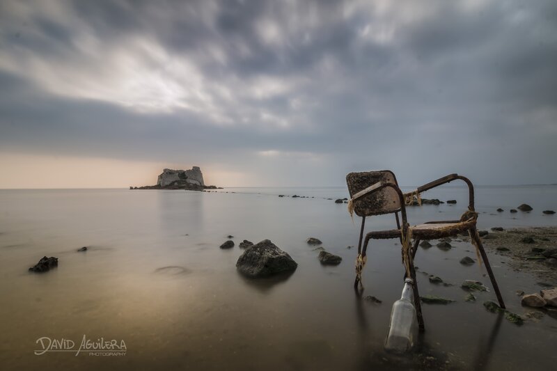 Rusty Chair on Beach