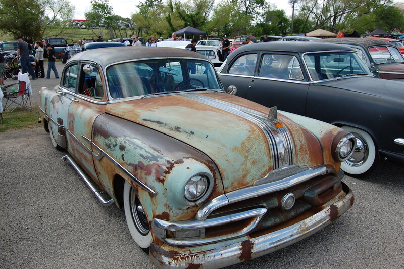 Rusty classic car at a show