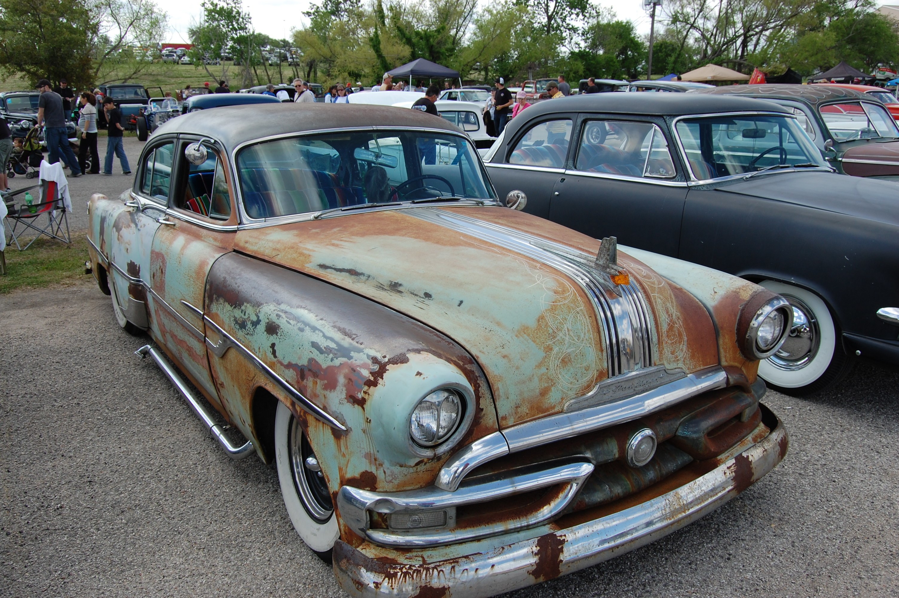 Rusty classic car at a show