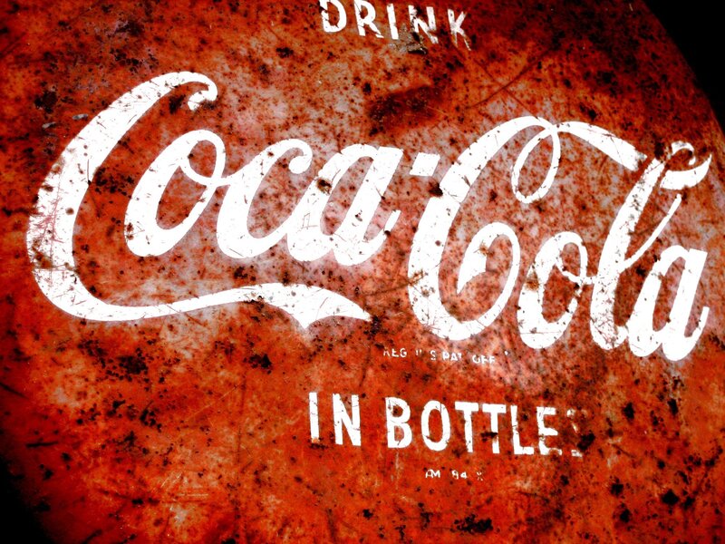 rusty coca-cola sign