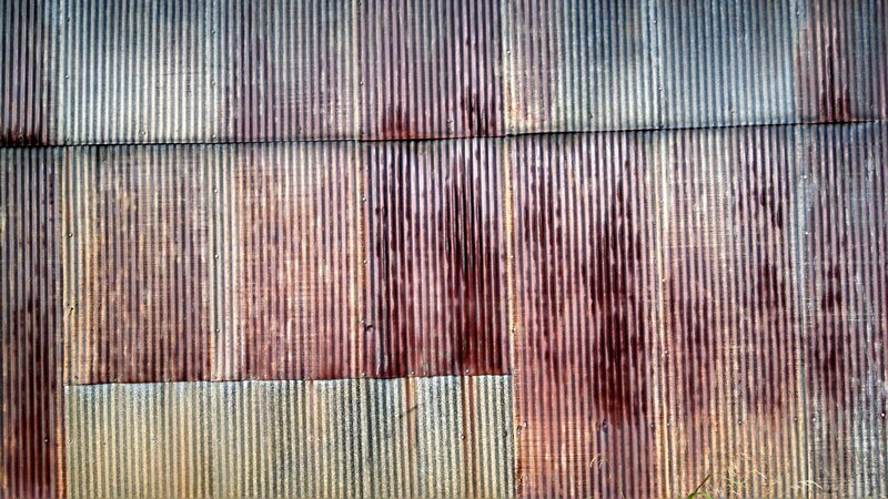 rusty corrugated metal wall