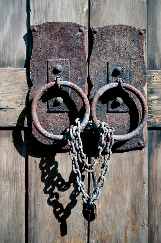 Rusty door with chain lock