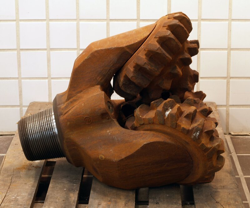 Rusty drill bit on pallet