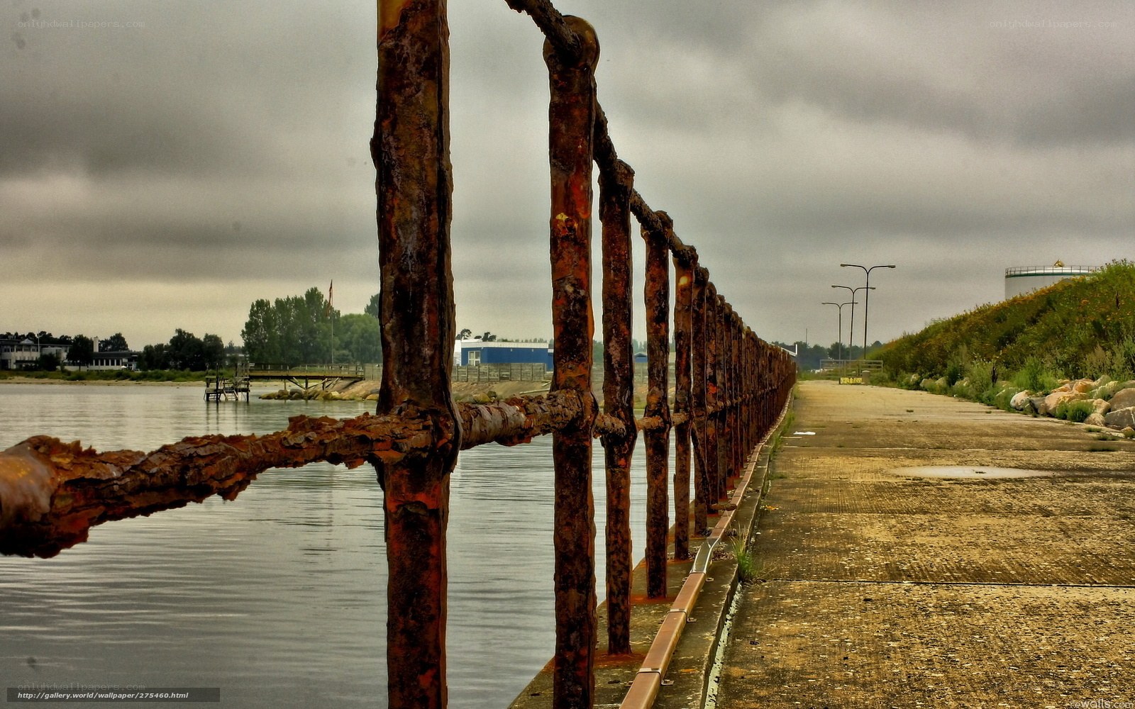 Rusty fence by the water