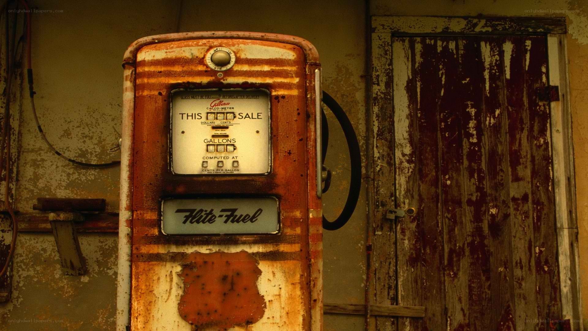 Rusty gas pump in abandoned station