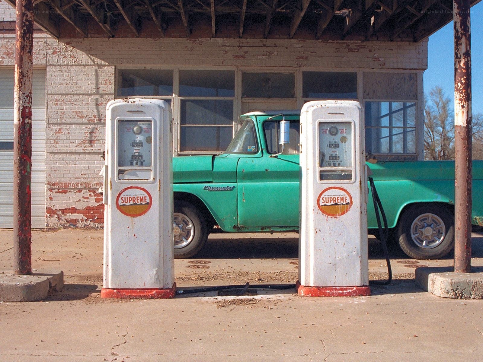 Rusty gas pumps at old station