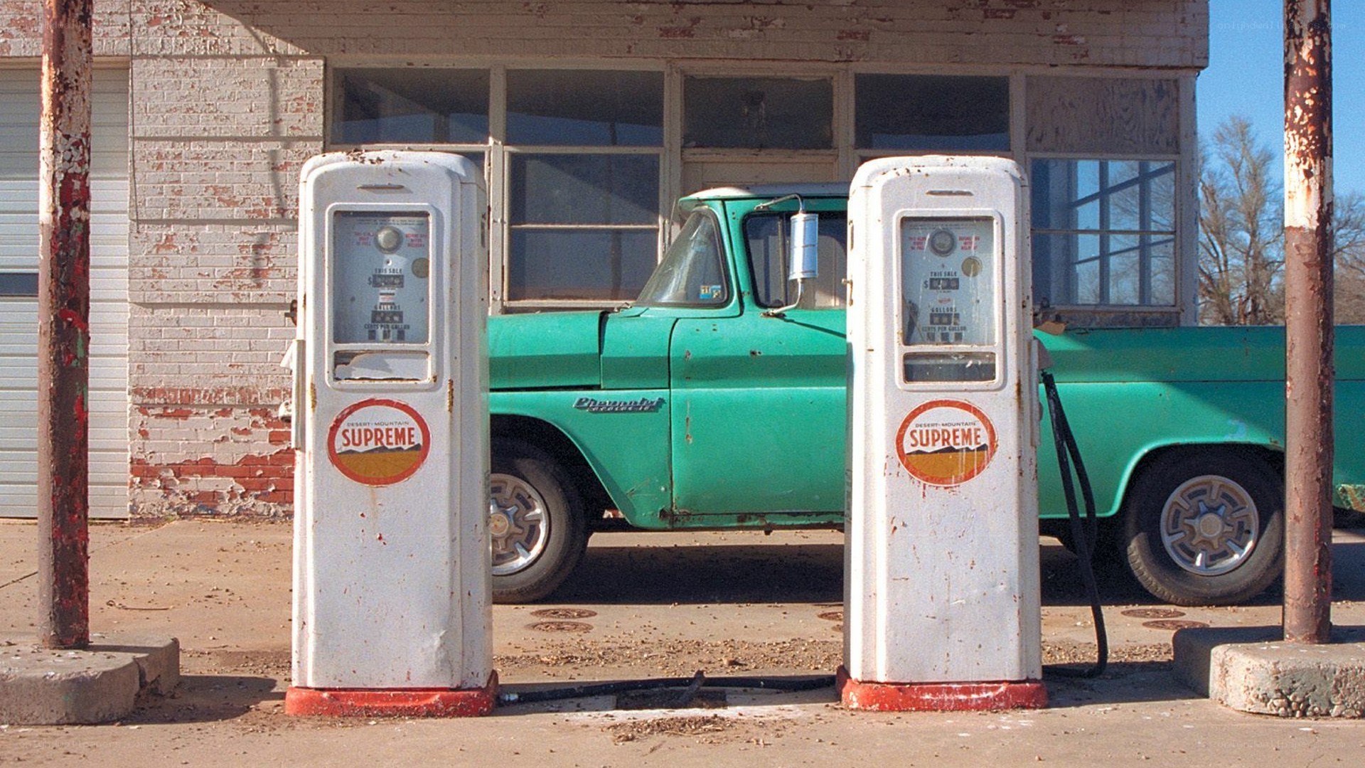 Rusty gas pumps at old station