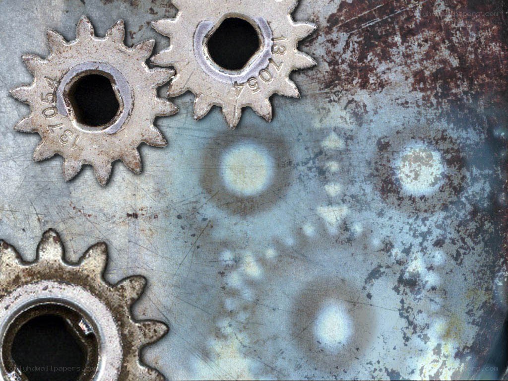 rusty gears on metal surface