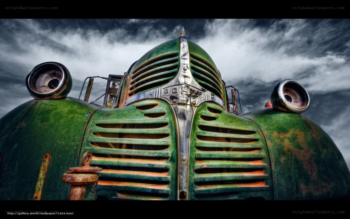 Rusty green vintage car front
