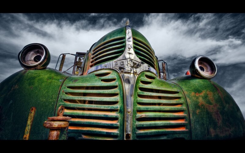 Rusty green vintage truck front