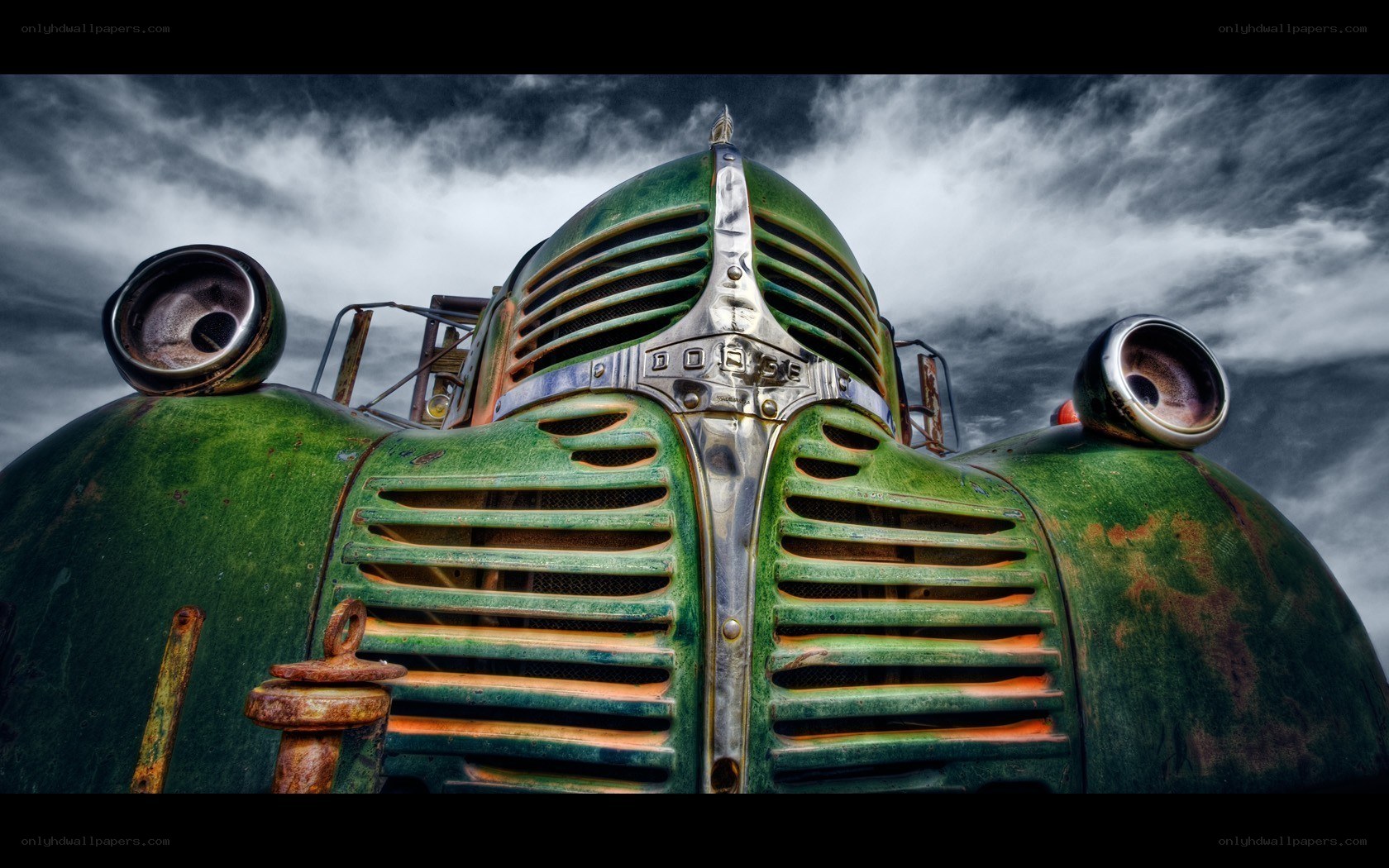 Rusty green vintage truck front