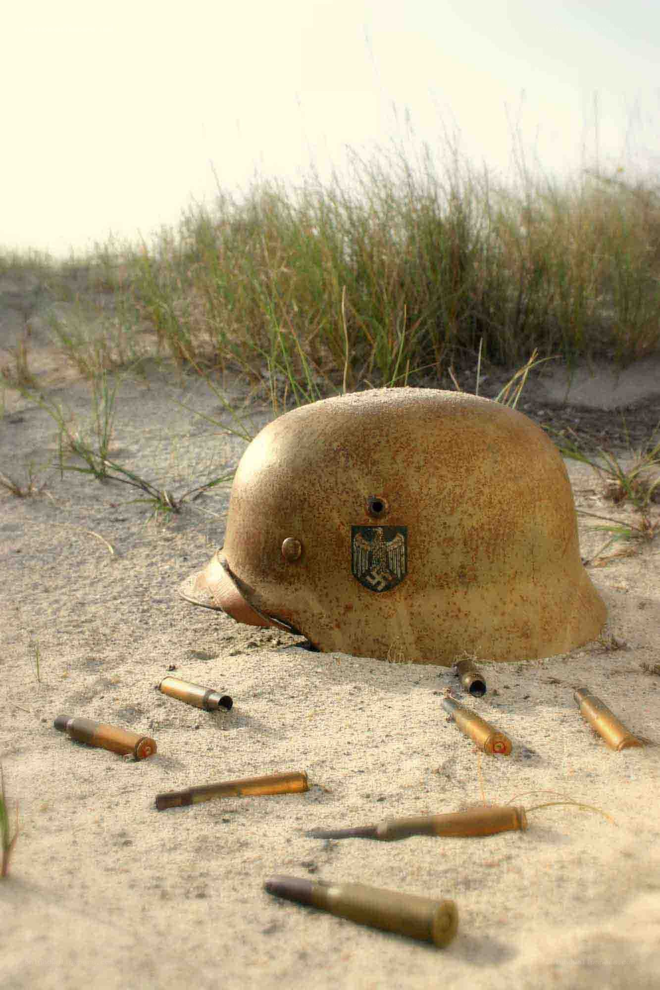 Rusty helmet and bullet casings
