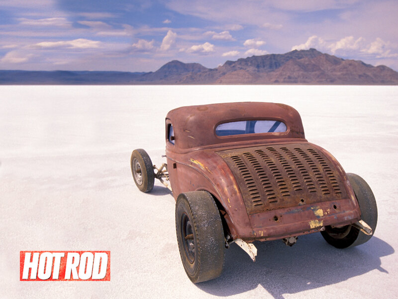 Rusty hot rod on salt flat