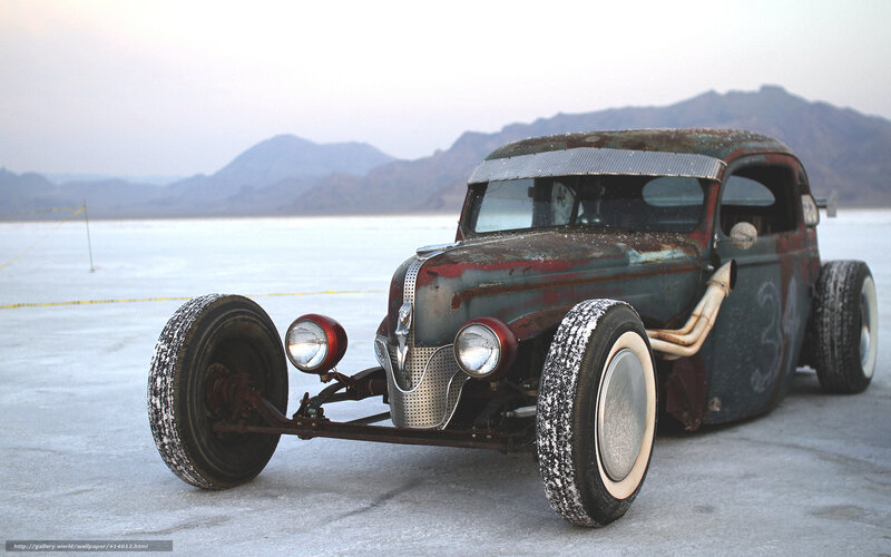 Rusty hot rod on salt flat