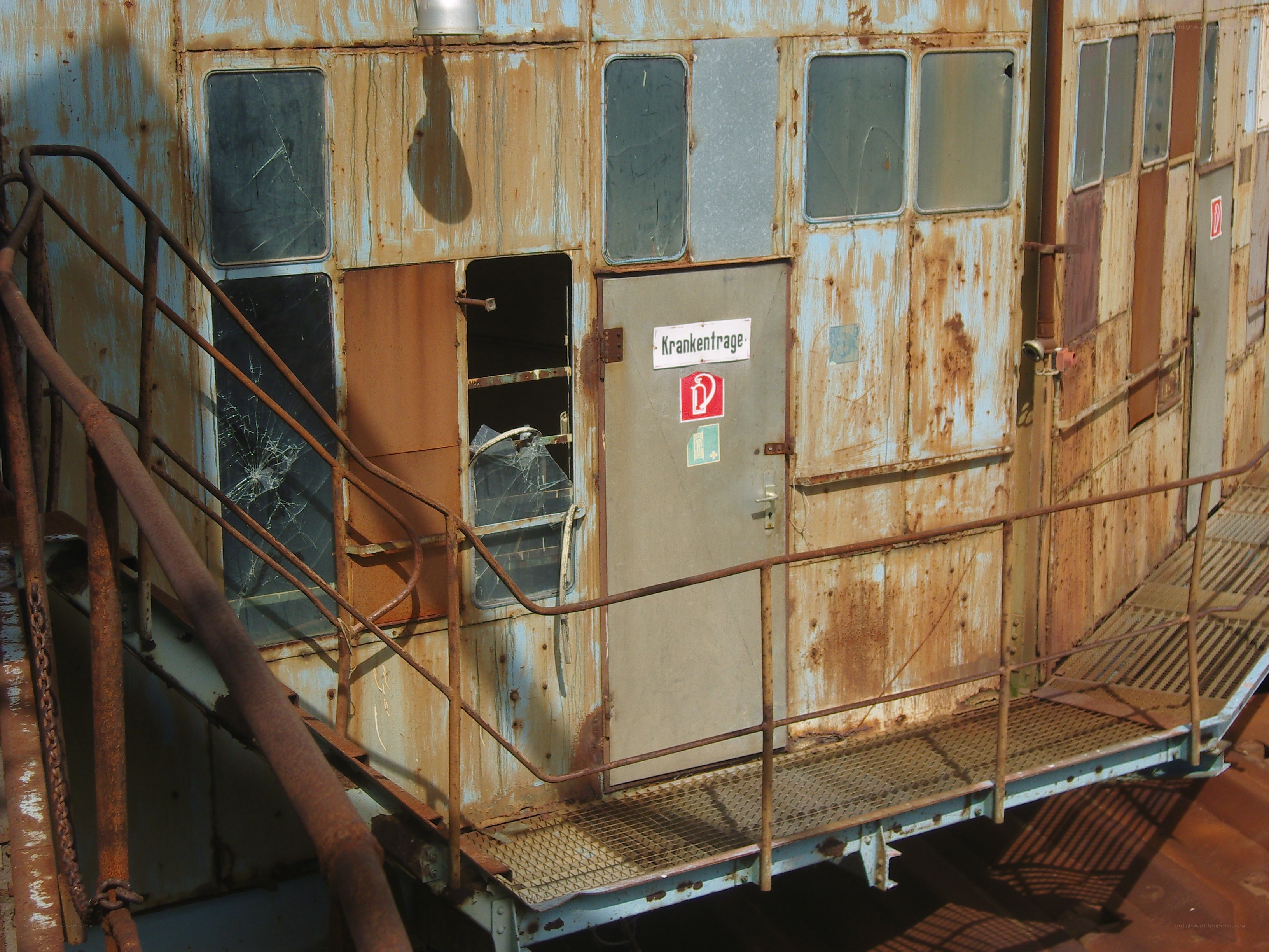 Rusty industrial cabin exterior