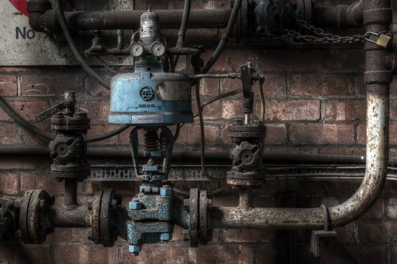 Rusty Industrial Pipes — Brown