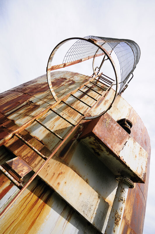 Rusty industrial tower structure