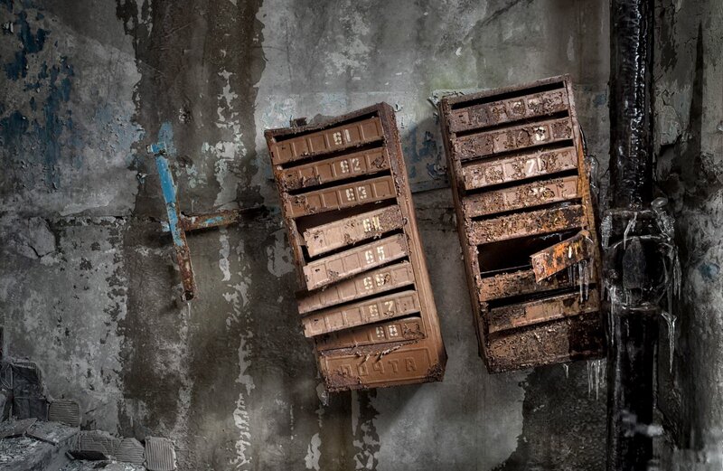 Rusty Mailboxes on Wall