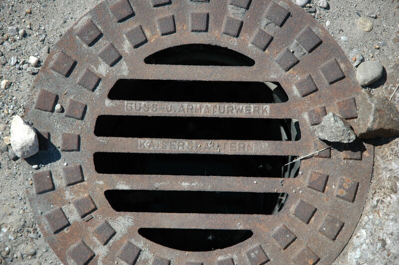 rusty manhole cover