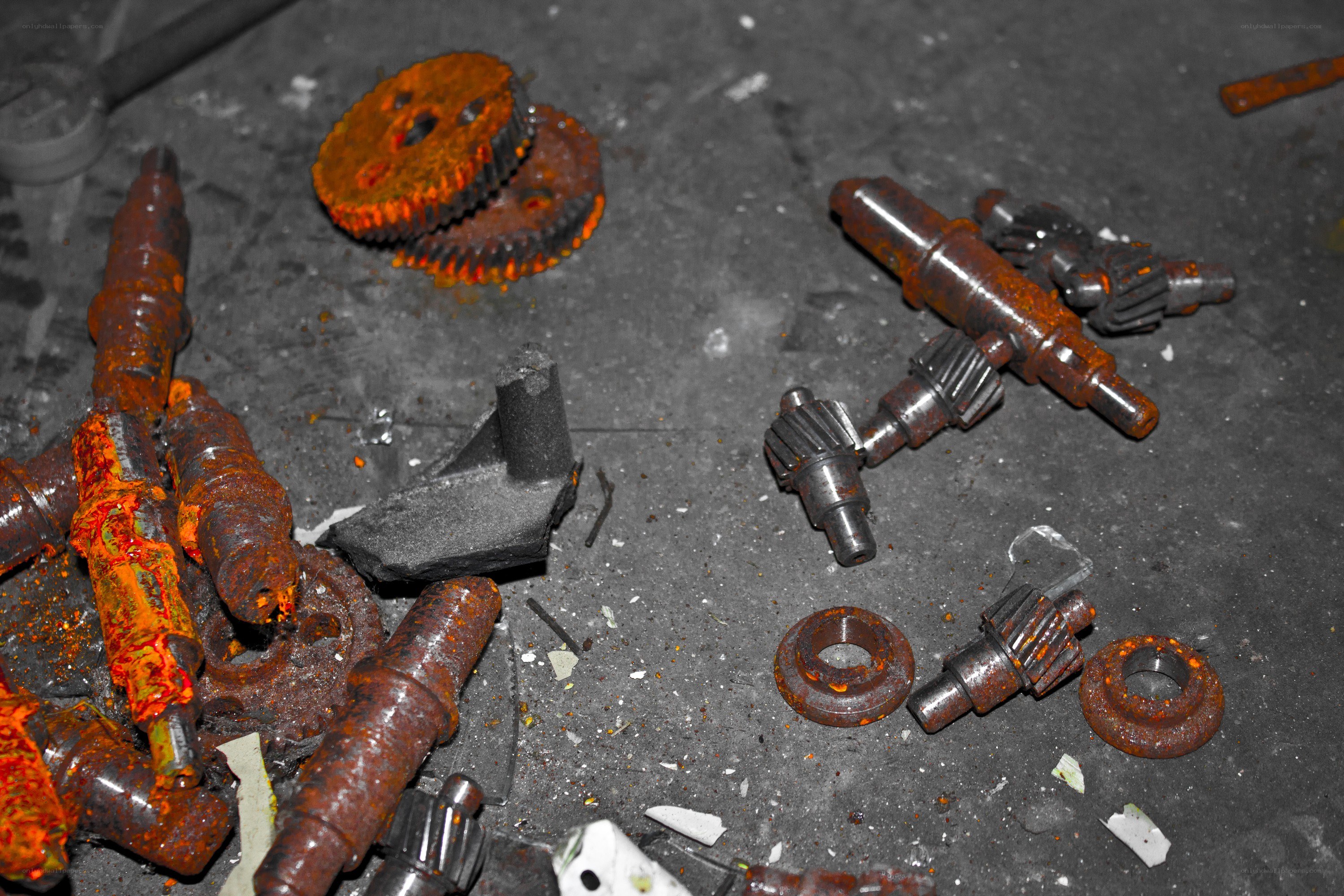rusty mechanical parts on floor