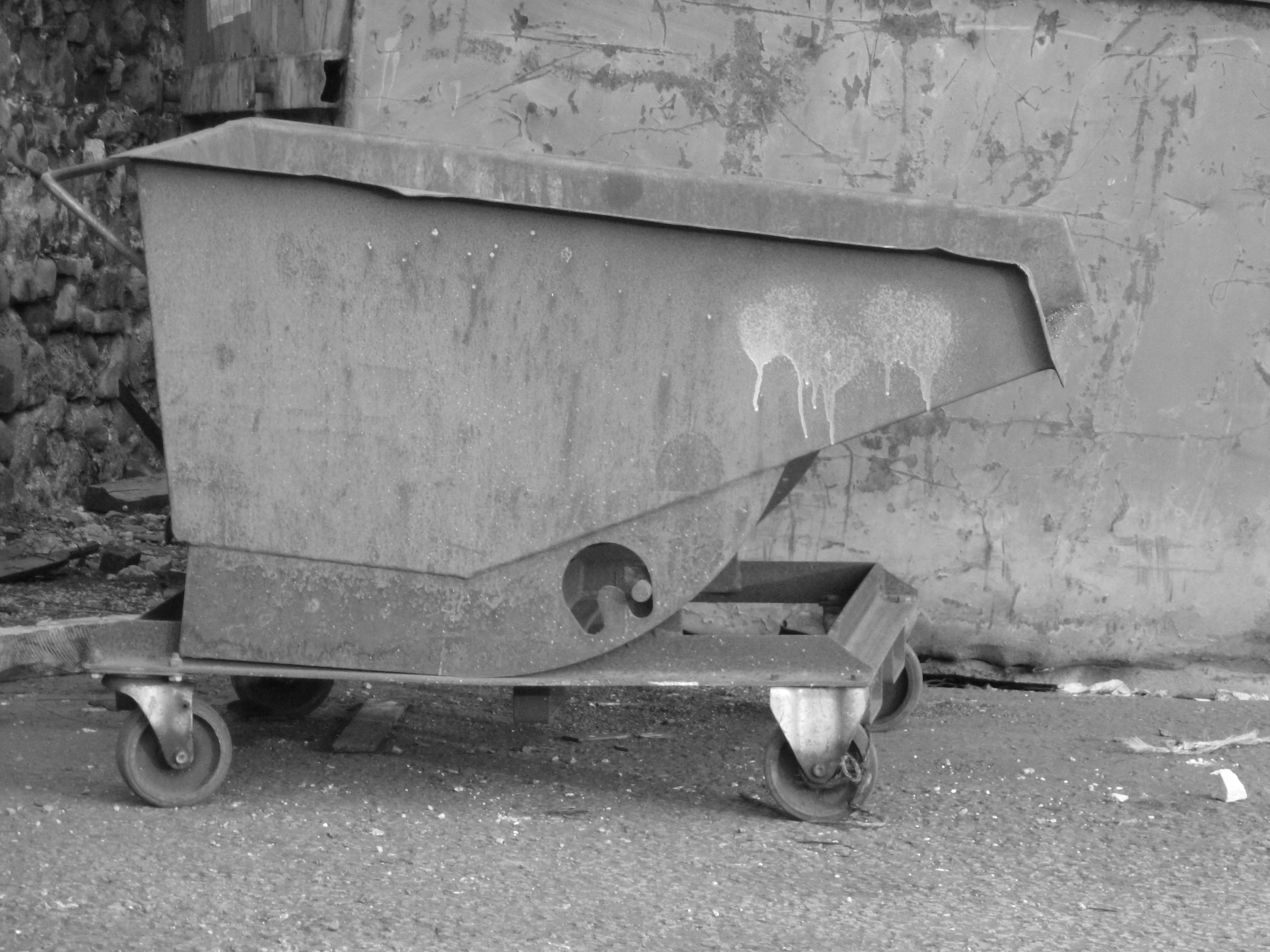 Rusty metal cart on wheels