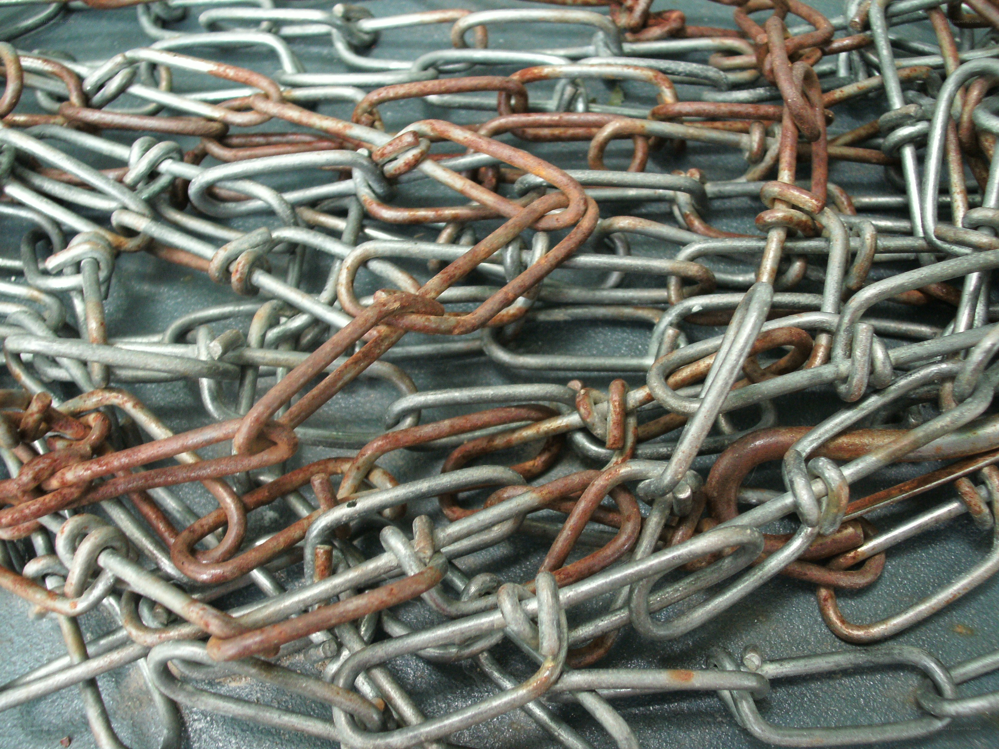 rusty metal chains pile