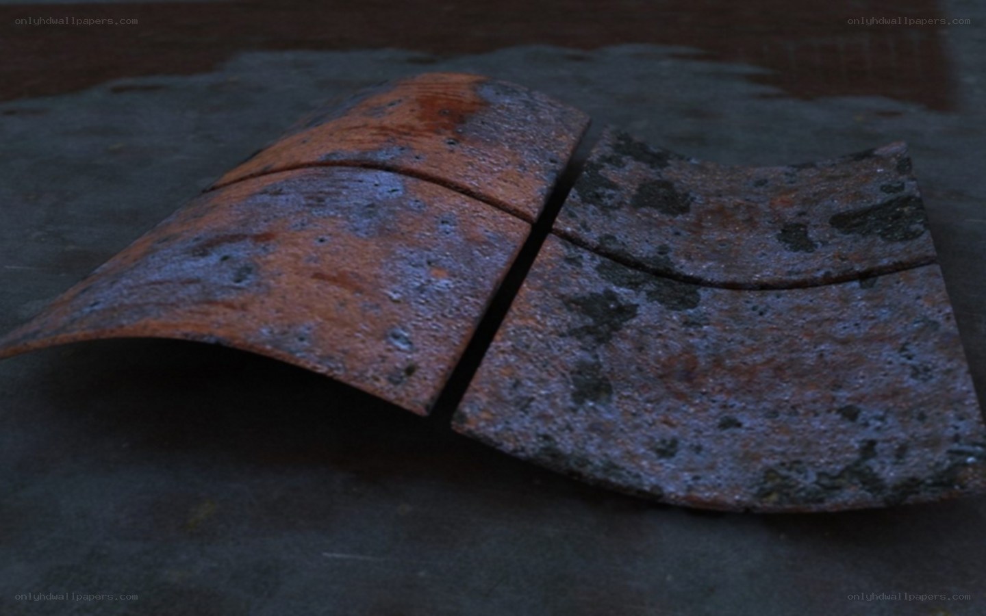 Rusty metal fragments on ground