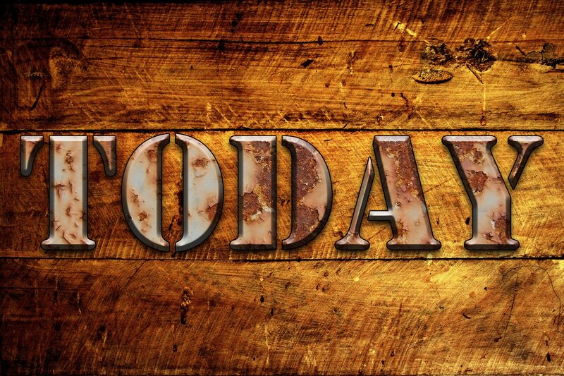 rusty metal letters on wood
