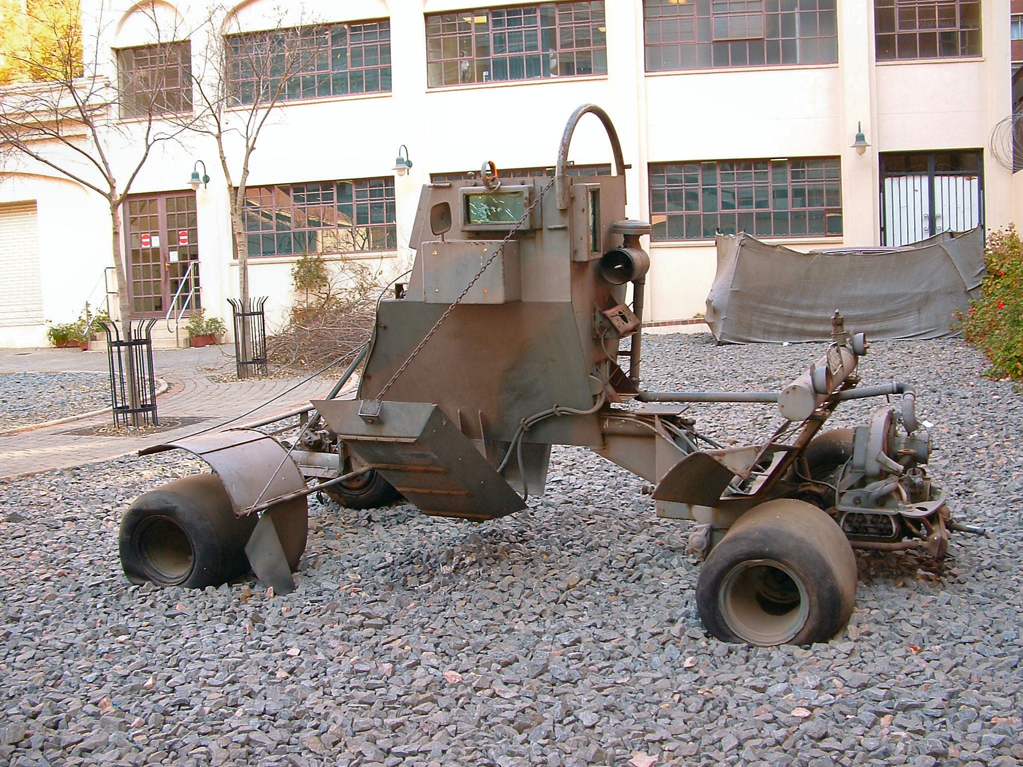 Rusty military vehicle on display