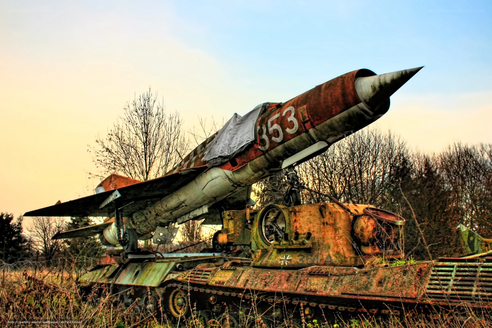 Rusty missile launcher in field