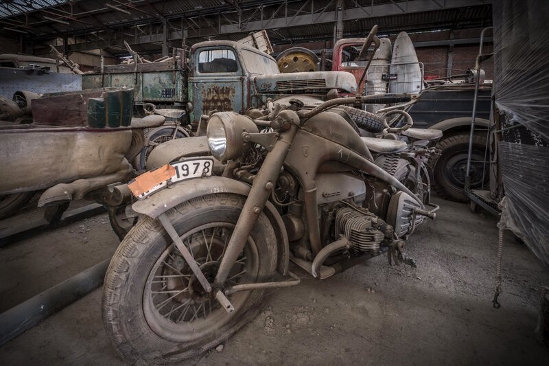 Rusty Motorcycle in Warehouse