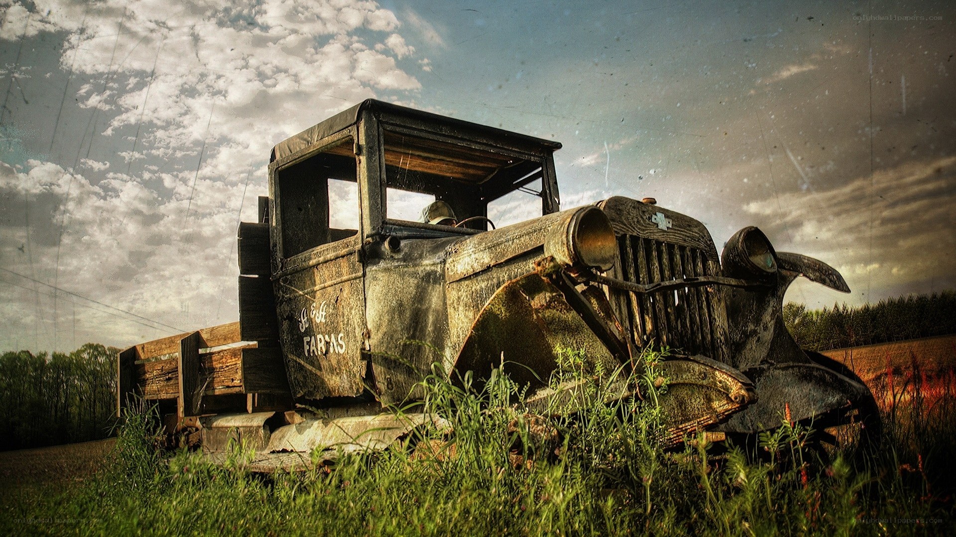 Rusty old truck in a field