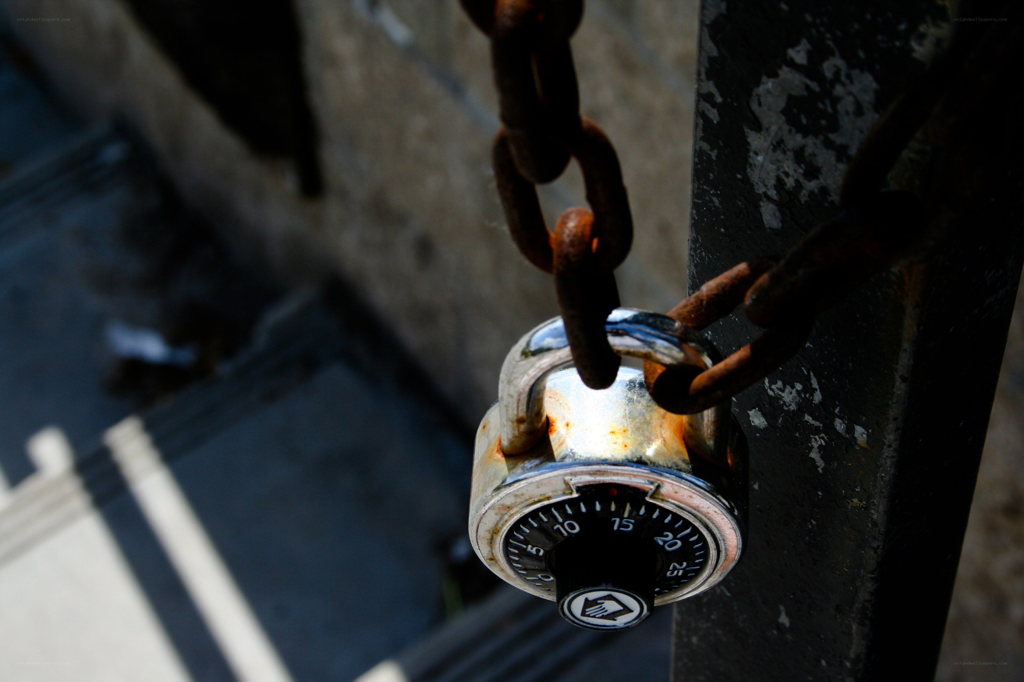 Rusty padlock on chain