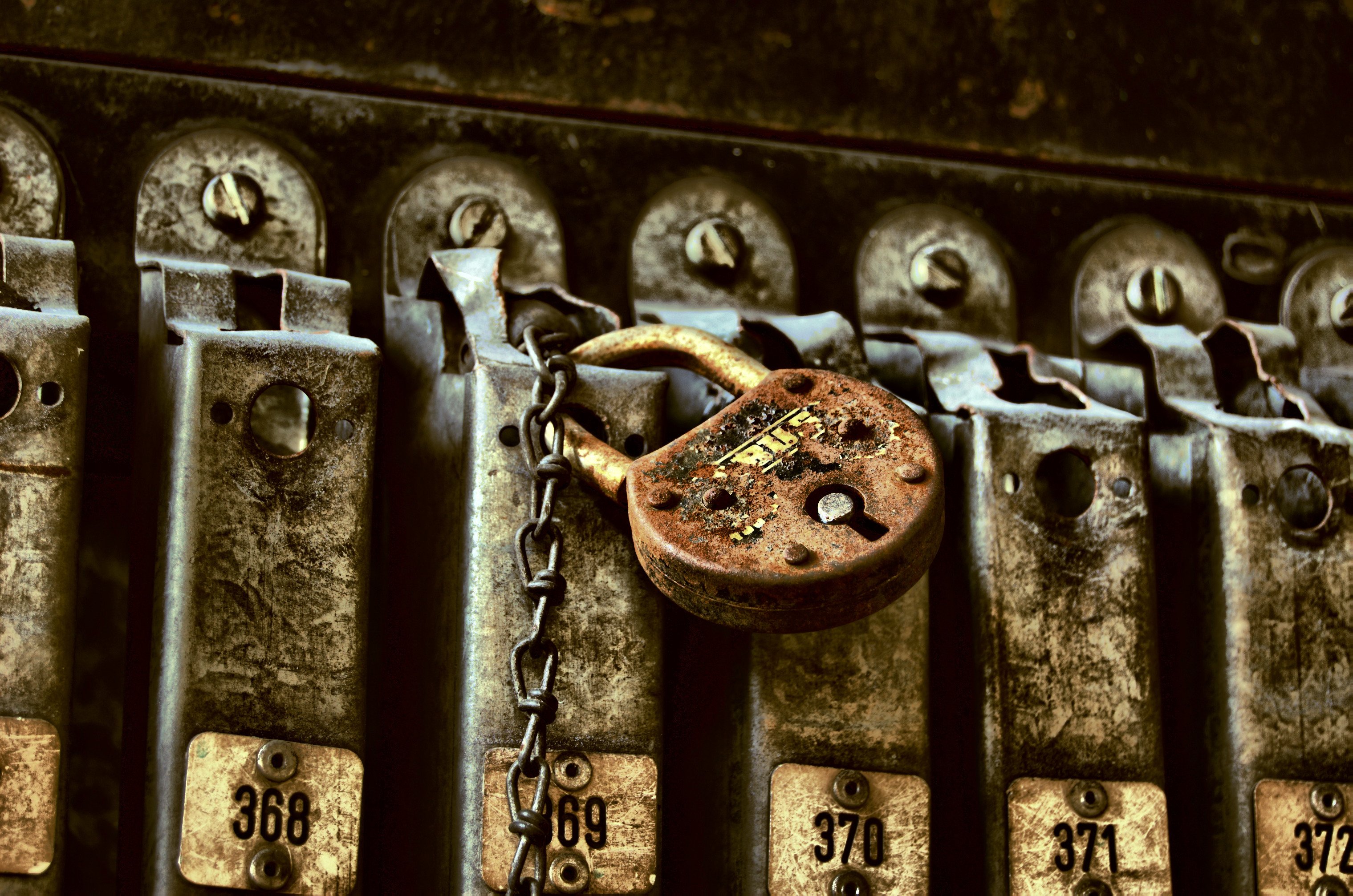 Rusty padlock on lockers